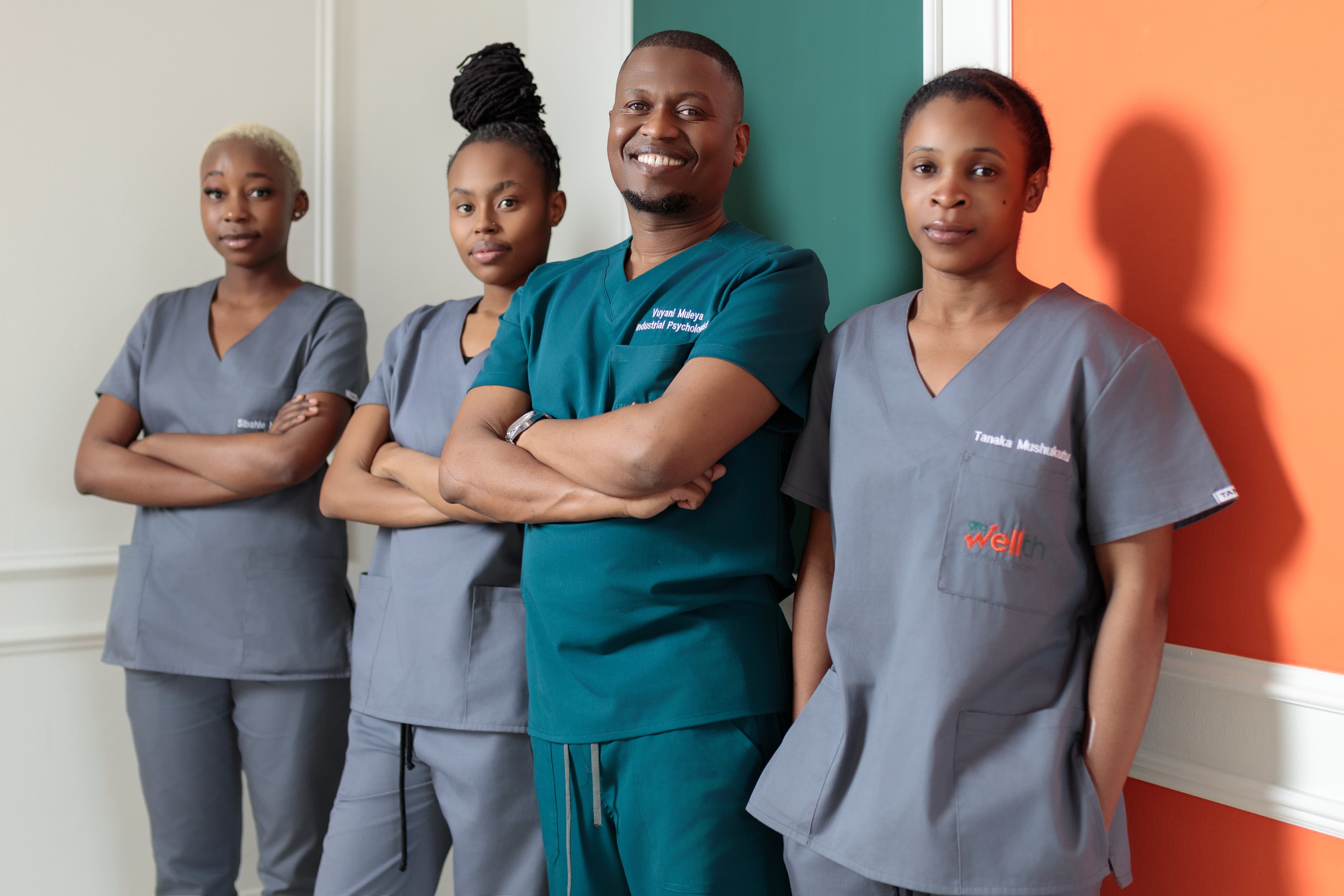 Growellth Team - Professional healthcare team in medical scrubs